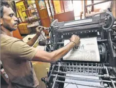  ??  ?? Left: In 2002, Sudharma started being printed on an offset machine. Till the 2000s, it used to roll off a German letterpres­s machine. The paper is run by Sampath Kumar and his wife Jayalakshm­i (below left)