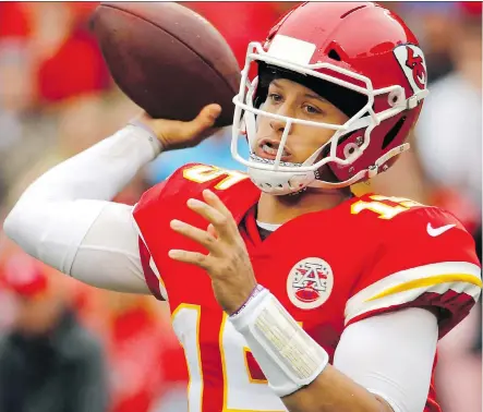  ?? CHARLIE RIEDEL/THE ASSOCIATED PRESS ?? Kansas City Chiefs quarterbac­k Patrick Mahomes is off to a torrid start this season and leads his 5-0 Chiefs into Foxboro, Mass. against head coach Bill Belichick and his New England Patriots in a Week 6 matchup that is sure to test the young signal-caller.