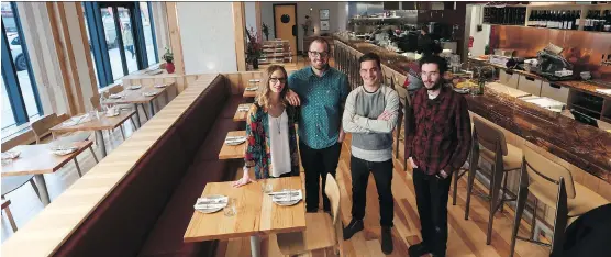  ?? GAVIN YOUNG ?? Donna Mac partners Amy Turner, Jesse Willis, Jeff Jamieson and Justin “Tino” Longpre in the restaurant on the ground floor of the new Versus building.
