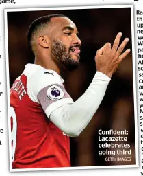  ?? GETTY IMAGES ?? Confident: Lacazette celebrates going third