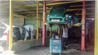  ??  ?? Clockwise from below Changing the clutch in Managua, Nicaragua – the only major work the TVR required during its 27,000-mile trip; a pause in Panama City; rounding a corner to come face-to-face with the 5897m Cotopaxi Volcano in Ecuador.