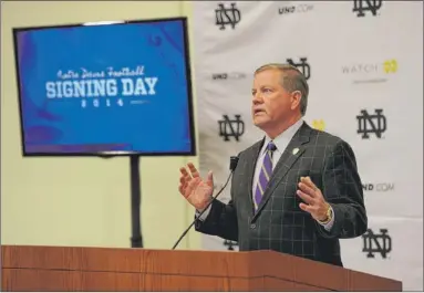  ?? | AP PHOTO ?? Notre Dame football coach Brian Kelly talks about recruits during signing day Wednesday at Notre Dame.