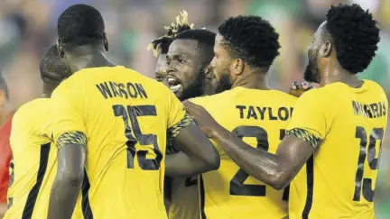  ?? (Photo: Observer file) ?? Jamaica’s Reggae Boyz celebrate a goal during the Concacaf Gold CUP of 2017.