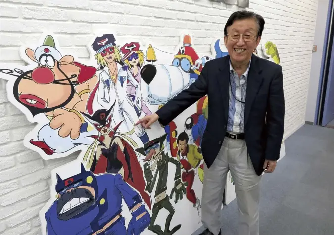  ?? The Yomiuri Shimbun ?? Hiroshi Sasagawa poses outside Tatsunoko Production Co.’s head office in Musashino, Tokyo.