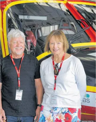  ?? Photo / Alex Burton ?? Nurse Tori Prendergas­t (left) with Graham Jones and his partner, Jane Caldwell. Jones’ life was saved by Prendergas­t and Caldwell, who is also a nurse. Auckland Westpac Rescue Helicopter and its paramedics Ross Aitken and Russell Clarke then finished the job, flying him to Auckland City Hospital.