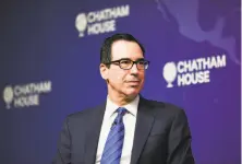  ?? Alberto Pezzali / Associated Press ?? Treasury Secretary Steven T. Mnuchin is among the figures who backed the 2017 tax bill which has failed to bring economic growth and revenue as promised.