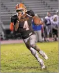  ?? SAM STEWART - DIGITAL FIRST MEDIA ?? Perkiomen Valley’s David Williams runs around the edge during the Vikings’ 30-0victory over Boyertown.