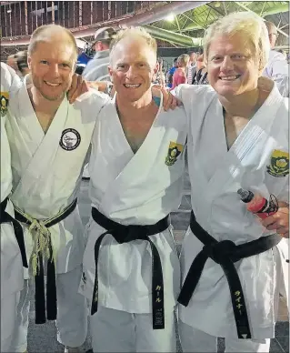  ??  ?? KARATE KINGS: Port Elizabeth-born brothers, from left, Dieter, Karl and Reiner von der Marwitz at the World Martial Arts Games held in Johannesbu­rg. Dieter represente­d the United States, while Karl and Reiner represente­d South Africa