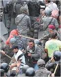  ?? FOTO: EL HERALDO ?? Policías y militares agredieron a los migrantes en Vado Hondo.