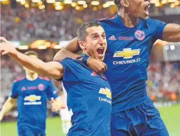  ?? AFP ?? Henrikh Mkhitaryan (left) celebrates his goal with Paul Pogba during the Europa League final on Wednesday.