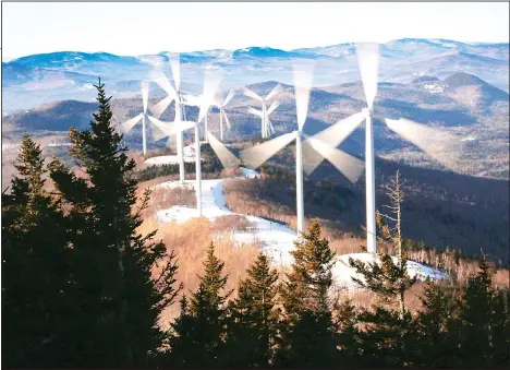  ??  ?? In this March 19, 2019 file photo, the blades of wind turbines catch the breeze at the Saddleback Ridge wind farm in Carthage, Maine. Scientists say emissions worldwide need to start falling sharply from next year if there is to be any hope of achieving the Paris climate accord’s goal of capping global warming at 1.5 degrees
Celsius (2.7 Fahrenheit). (AP)