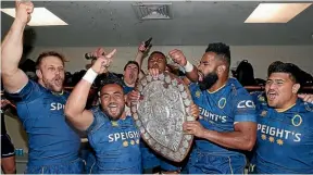  ?? GETTY IMAGES ?? Otago players celebrate winning the Ranfurly Shield after beating Waikato 23-19 on Saturday in Hamilton.