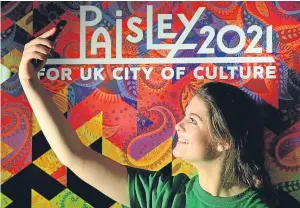  ??  ?? Abby McCann takes a selfie in front of the Paisley 2021 logo. Below: Perth launching its bid in August last year.