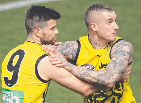  ?? Picture: GETTY IMAGES ?? MIND GAMES: Trent Cotchin and Dustin Martin during Tigers training at Punt Road Oval yesterday.