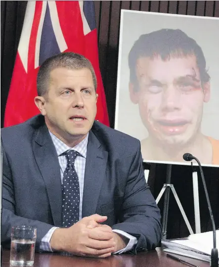  ?? COLIN PERKEL/ THE CANADIAN PRESS/ FILES ?? Then-ombudsman André Marin is seen in 2013 following the release of his report on jail-guard brutality at the Ontario legislatur­e in Toronto. Marin’s presentati­on included a jarring photo of inmate Jean-Paul Rhéaume, whose head was split open while in custody in 2010.