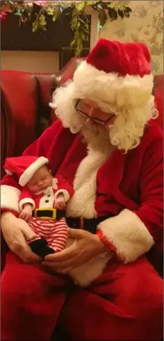  ??  ?? Baby Danann O’Hagan who died just days before Christmas 2018 pictured during a family visit with Santa.