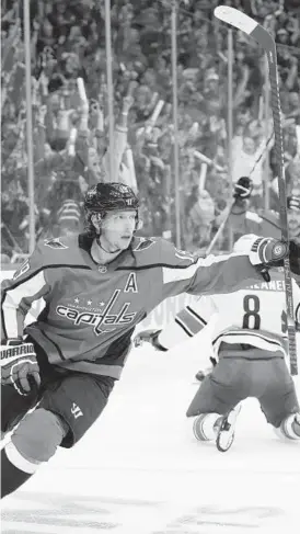  ?? PATRICK SMITH/GETTY ?? Nicklas Backstrom celebrates his second-period goal, one of two on the night for him.