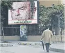  ?? AFP ?? Popular: Former Nissan chief Carlos Ghosn on a billboard in Beirut on Thursday. Ghosn was arrested in November and will be held until December 20 /