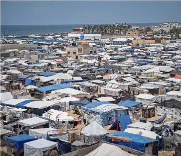  ?? ?? REFUGEES: Tents for displaced people in central Gaza after thousands fled Rafah.