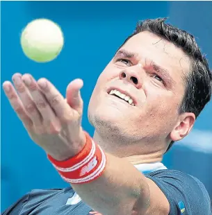  ?? JASON DECROW THE ASSOCIATED PRESS ?? Thornhill’s Milos Raonic had 26 aces in his first-round victory over Carlos Berlocq of Argentina but admitted he was a little undiscipli­ned in some of his service games.