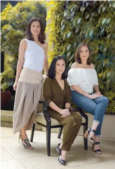  ??  ?? TRICKIE LOPA, Dindin Araneta, and Lisa Periquet, founders of Art Fair Philippine­s, photograph­ed by Kyla Olives