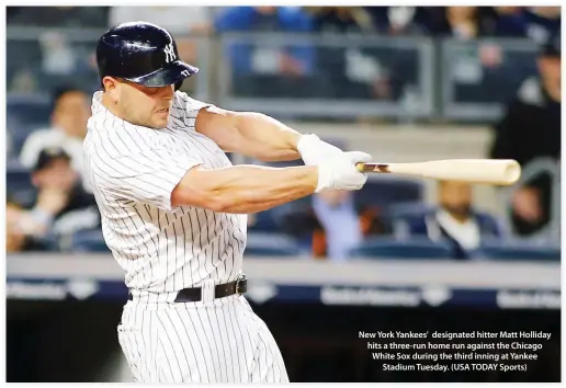  ??  ?? New York Yankees' designated hitter Matt Holliday hits a three-run home run against the Chicago White Sox during the third inning at Yankee Stadium Tuesday. (USA TODAY Sports)