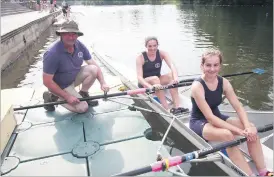  ?? (Pic: The Avondhu Archive) ?? Cappoquin Rowing Club representa­tives Ana Powell and Orla Ni Cottier, with their coach, Frankie Ahern, at Fermoy Regatta in 2018. The regatta returns in 2022 with a reduced format on Sunday, July 3.