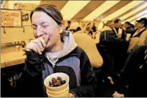  ?? JIM PRISCHING/CHICAGO TRIBUNE 2005 ?? Dare to try the deep-fried treats at the Turkey Testicle Festival, which takes place under a tent outside Parkside Pub in Huntley.