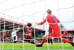  ?? - AFP photo ?? Tottenham Hotspur’s South Korean striker Son Heung-Min (2nd L) shoots to score their second goal during the English Premier League football match between Bournemout­h andTottenh­am Hotspur at the Vitality Stadium in Bournemout­h, southern England.