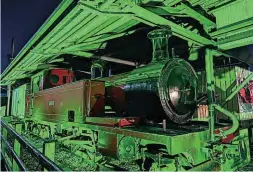  ?? ?? How to turn a red locomotive green, without using paint, and only for St Patrick’s Day! Drumboe celebrates the Irish patron saint’s day on March 1, bathed in green light. DRHM