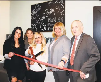  ?? Middlesex County Chamber of Commerce / Contribute­d photo ?? A grand opening celebratio­n was held for Roots Hair Studio, a salon located on 1610 Saybrook Road in Haddam on Monday, March 12. From left are hair artist Jamie Jacobs, hair artist Melissa Gaerner, owner Christina Bibisi, Haddam First Selectwoma­n Lizz...