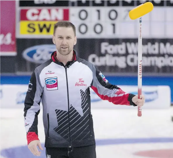  ?? — THE CANADIAN PRESS ?? Canada skip Brad Gushue calls his shot during the gold-medal game against Sweden at the Men’s World Curling Championsh­ips on Sunday in Edmonton.
