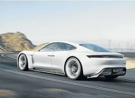  ??  ?? Porsche’s Mission E will not be the only electrifie­d sports car within the Volkswagen Group. Below left: Details of the Volkswagen Group electrific­ation strategy timetable show a big focus on e-mobility by 2030.