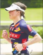  ??  ?? LEFT: Liz Borrett and Janice Bradshaw celebrate at the finish line. RIGHT: Malindi Elmore on the run in Texas.