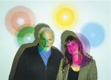  ?? Russell Yip / The Chronicle ?? Paul Ekman and daughter Eve, authoritie­s on emotions and empathy, in front of a projection of the “Atlas of Emotions.”