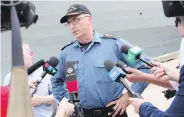  ??  ?? Rear Admiral John Newton speaks with reporters at HMC Dockyard in Halifax on Tuesday.