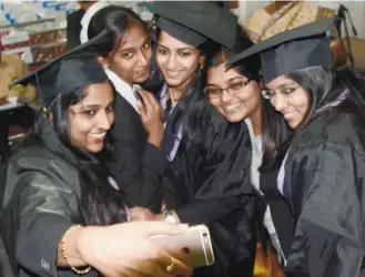  ??  ?? GRADUATES of the Damodaram Sanjivayya National Law University after receiving their degrees at the first convocatio­n of the university in Visakhapat­nam in December 2014.