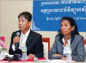  ??  ?? Former Radio Free Asia journalist­s Sok Ratha (left) and Ouk Savborey (right) speak to the press yesterday in Phnom Penh.