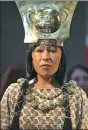  ?? GUADALUPE PARDO / REUTERS ?? A replica of the face of The Lady of Cao, the female ruler.
