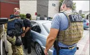  ?? CONTRIBUTE­D ?? Federal agents in Dallas participat­e in a targeted ICE operation in June that resulted in 70 arrests in the Dallas and Oklahoma areas during a three-day ICE operation targeting criminal aliens, illegal reentrants and immigratio­n fugitives.