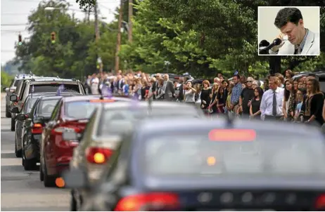 ?? PHOTOS: BRYAN WOOLSTON/AP & KCNA/EPA ?? MARK OF RESPECT: Mourners line the street after the funeral of Otto Warmbier in Wyoming, Ohio. Inset: Mr Warmbier cries during a media conference in Pyongyang in February last year.