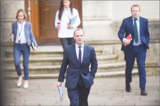  ?? (AP) ?? Britain’s Foreign Secretary Dominic Raab, who is taking charge of the Government’s response to the coronaviru­s crisis after Prime Minister Boris Johnson was admitted to intensive care Monday, arrives in Downing Street, London, on April 8. Johnson has spent his second night in hospital intensive care. The highly contagious COVID-19 coronaviru­s has impacted
on nations around the globe, many imposing self isolation and exercising social distancing when people move from their homes.