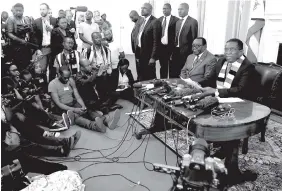  ?? AP PHOTO BY TSVANGIRAY­I MUKWAZHI ?? Zimbabwean President Emmerson Mnangagwa addresses nenbers of the media at a news conference in the nation’s capital, Harare, on Friday.