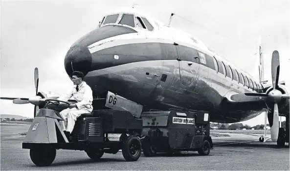  ?? ?? A Cotton Sturdy with a British Midland Vickers Viscount in the background.