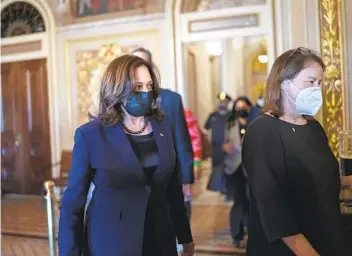  ?? J. SCOTT APPLEWHITE AP ?? Vice President Kamala Harris arrives Thursday to break a tie on a procedural vote as the Senate works on the Democrats’ $1.9 trillion COVID-19 relief package. The House approved the bill last week.