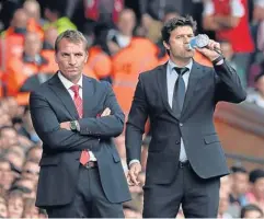  ?? AFP ?? Liverpool manager Brendan Rodgers, left, and Southampto­n boss Mauricio Pochettino.