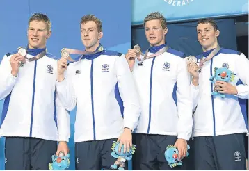  ??  ?? Duncan Scott (second right) pictured celebratin­g one of his bronze medals won in the men’s 4x200m freestyle final. Perth’s Stephen Milne is on the far right and Mark Szaranek (Glenrothes) is on the far left. Also shown is Dan Wallace.