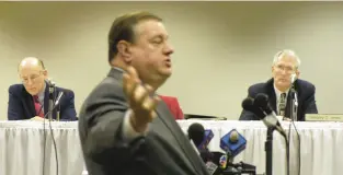  ?? PHIL VELASQUEZ/CHICAGO TRIBUNE ?? Attorney Michael Ficaro, center, who represents Emerald Casino, pleads his case to the Illinois Gaming Board about bringing gambling to Rosemont. Board members Mac Ryder, left, and Gregory Jones listen to Ficaro on Jan. 30, 2001.