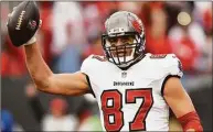  ?? Jason Behnken / Associated Press ?? Tampa Bay Buccaneers tight end Rob Gronkowski celebrates his touchdown against the Philadelph­ia Eagles during a wild-card game on Jan. 16 in Tampa, Fla. A four-time All-Pro tight end, Gronkowski announced his retirement again, Tuesday.