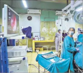  ?? PTI ?? Doctors perform a Diagnostic Nasal Endoscopy (DNE) on a patient to detect black fungus at NSCB medical college and hospital in Jabalpur on Thursday.